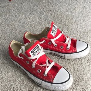 Red converse low tops